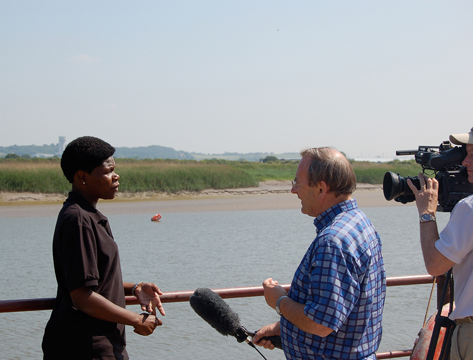 Community support coordinator Bev Mitchell being interviewed for Granada TV during The Mersey Baton Relay, June 2007.